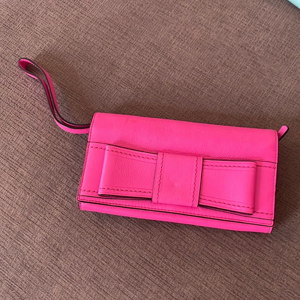 Hot pink Kate Spade bow wristlet